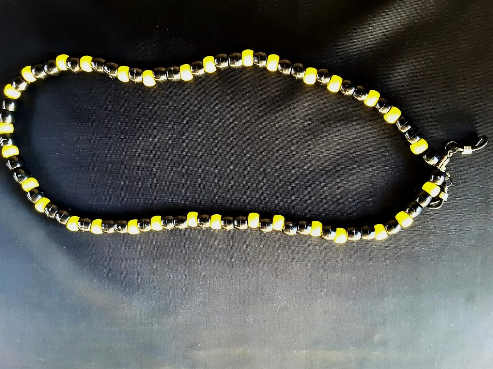Black and Yellow Beaded Glasses chain. For sale online by Aksêptuhns in South Africa.